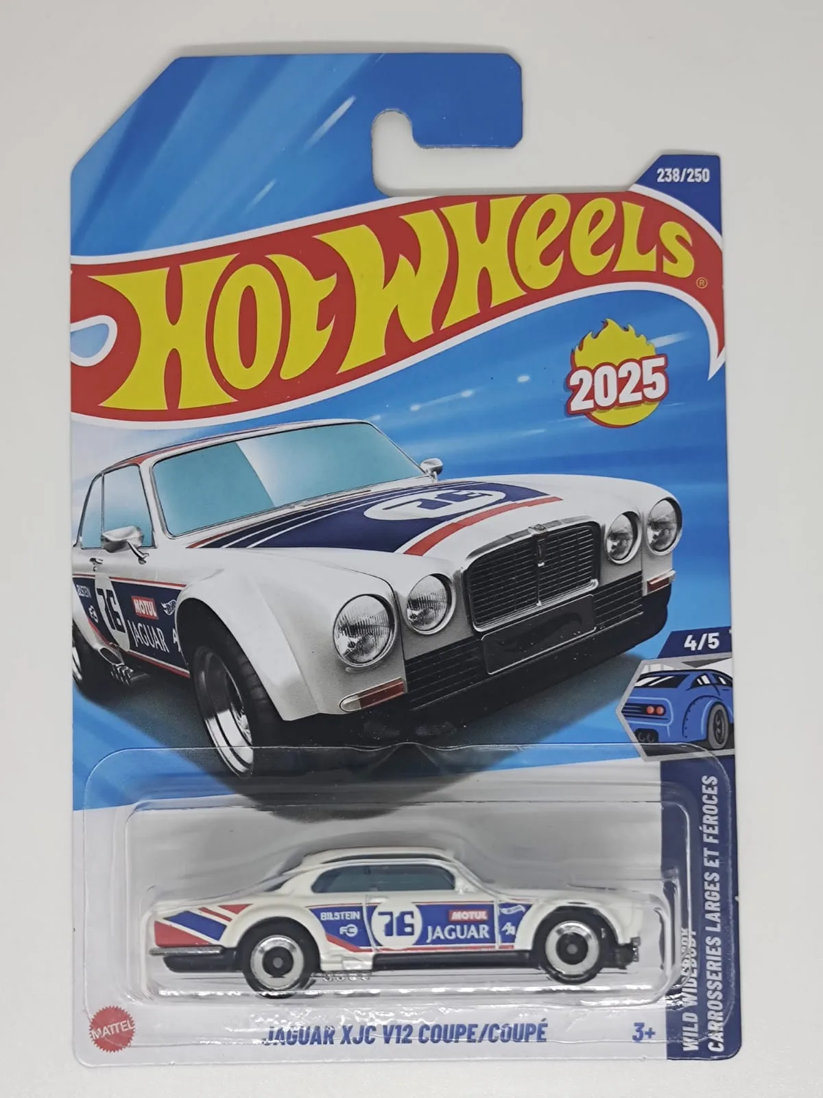 Jaguar XJC V12 Coupe — blanco con decoración azul y roja y número 76