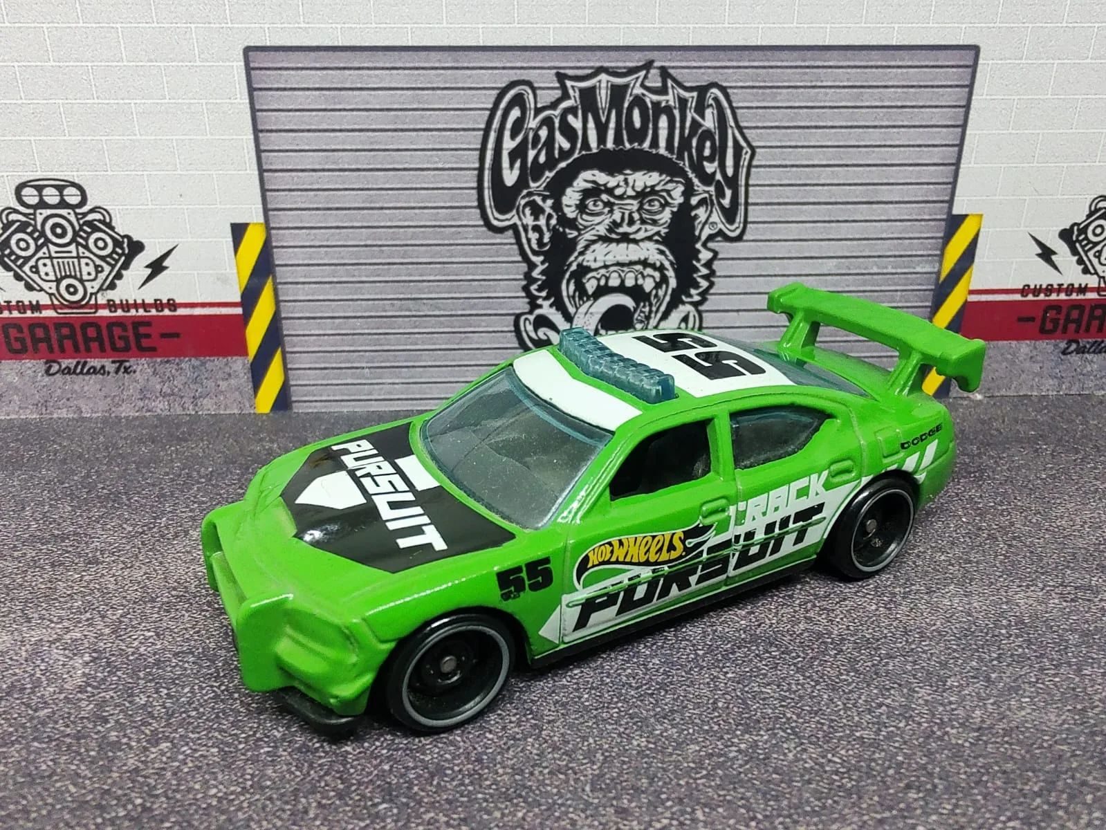 Dodge Charger Drift — verde lima, negro y blanco, PURSUIT y número 5