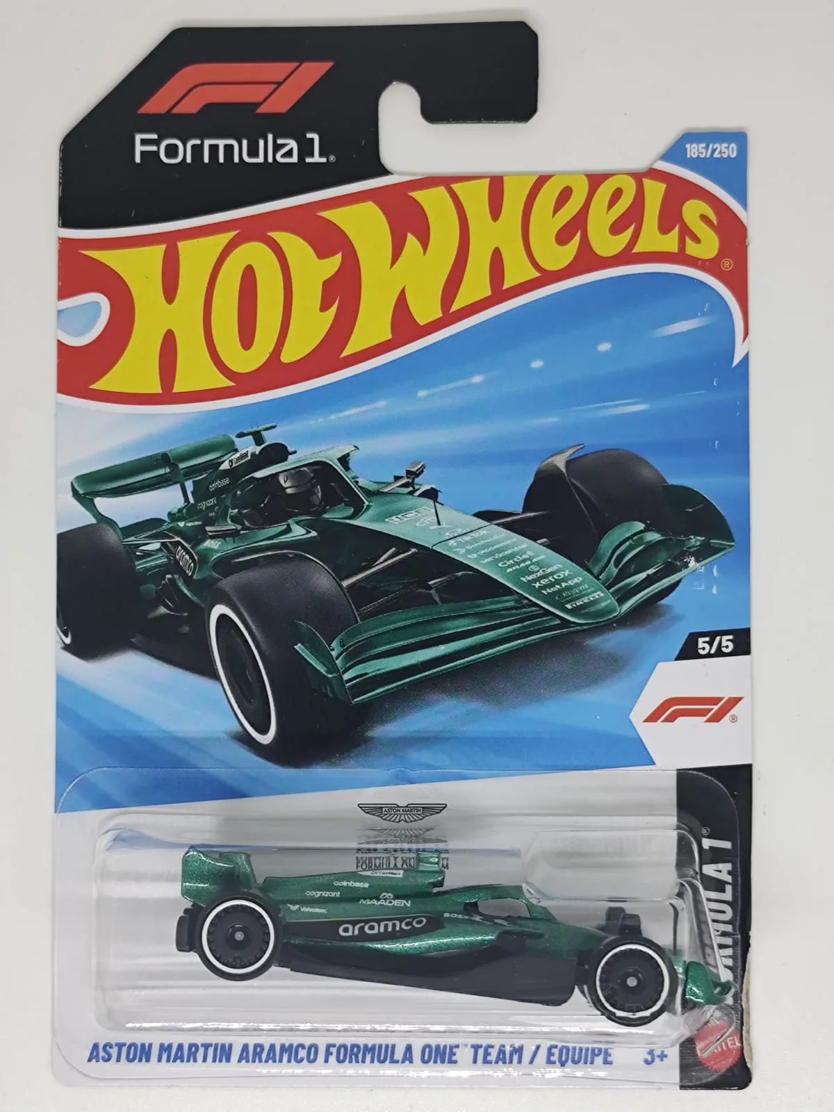 Aston Martin Aramco Formula One Team — monoplaza verde con decoración Aramco; en blíster