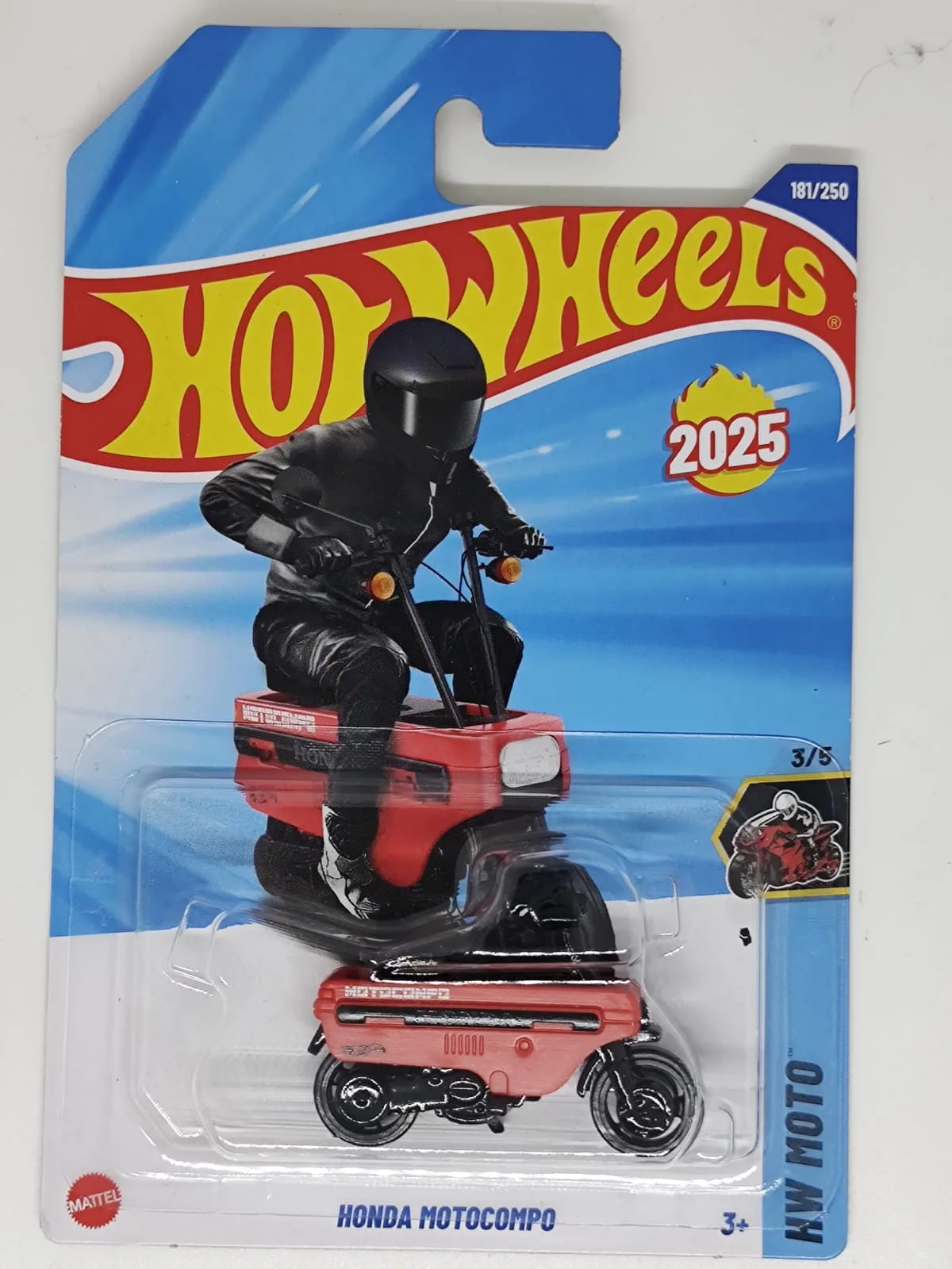 Honda Motocompo — motocicleta roja con figura de conductor negro