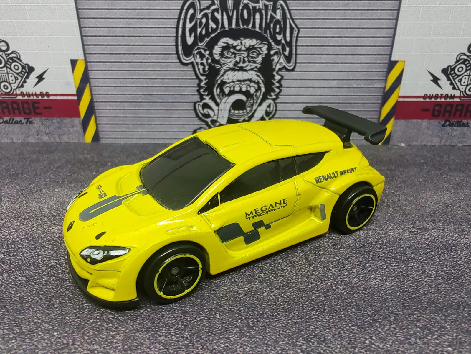 Renault Mégane Trophy — amarillo con dameros negros