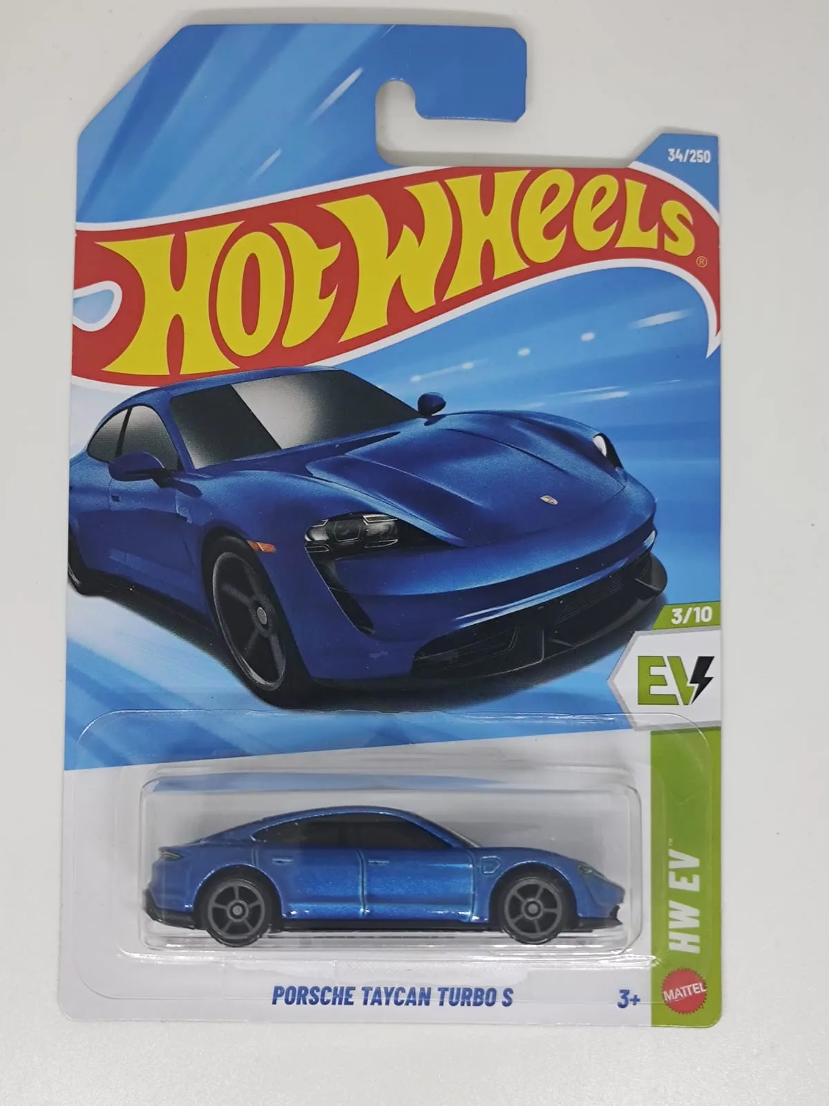 Porsche Taycan Turbo S — azul con ruedas negras